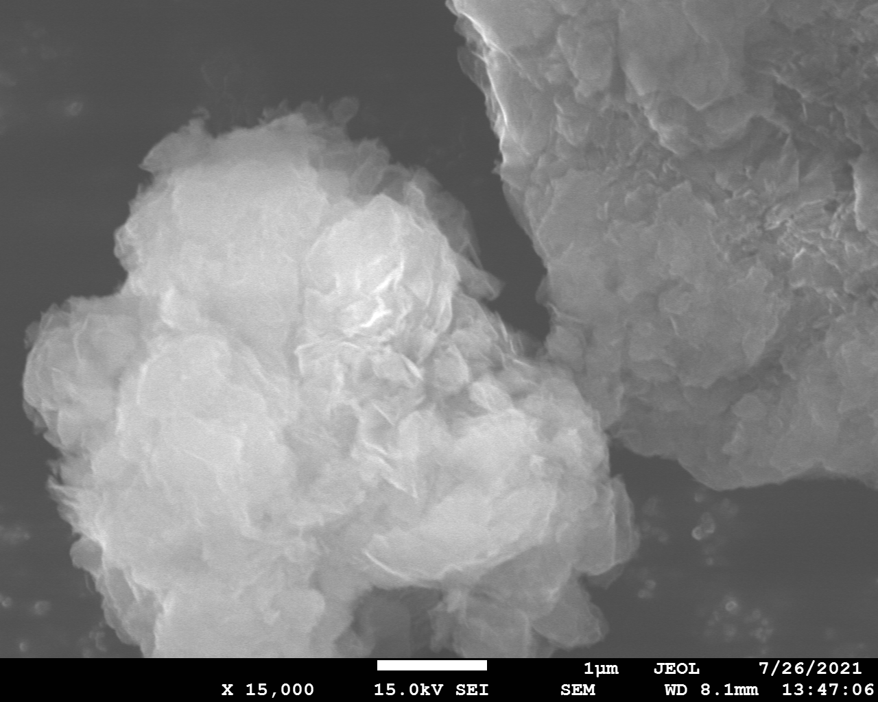 sem image of sample ball-milled in Ar at 450 r.p.m., x15000