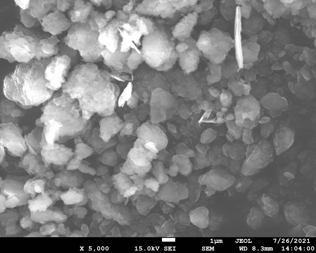 sem image of sample ball-milled in Ar at 450 r.p.m., x5000
